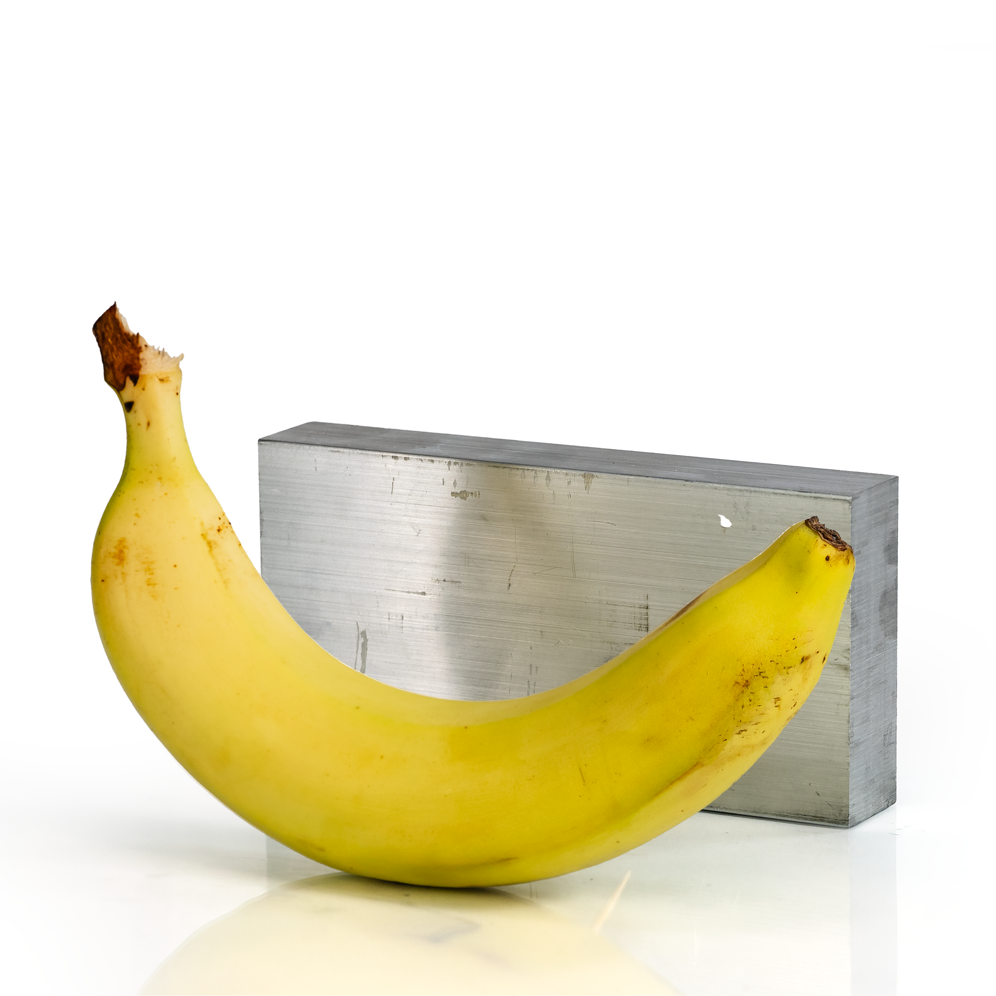 1x3x6 6061 T6 Aluminum Block with banana for scale - BananaMetals.com