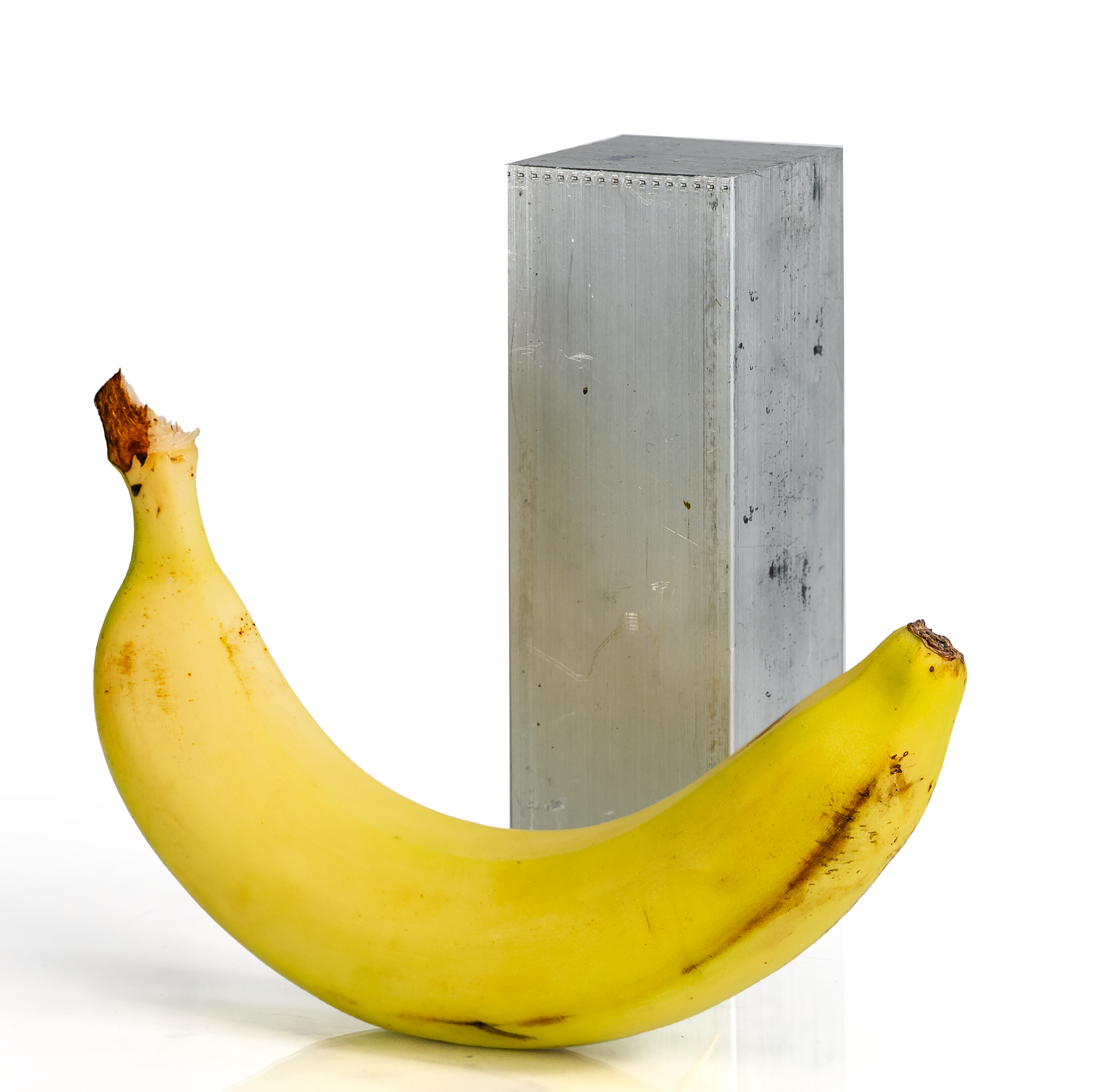 2x2x6 6061 T6 aluminum block with banana for scale - bananametals.com