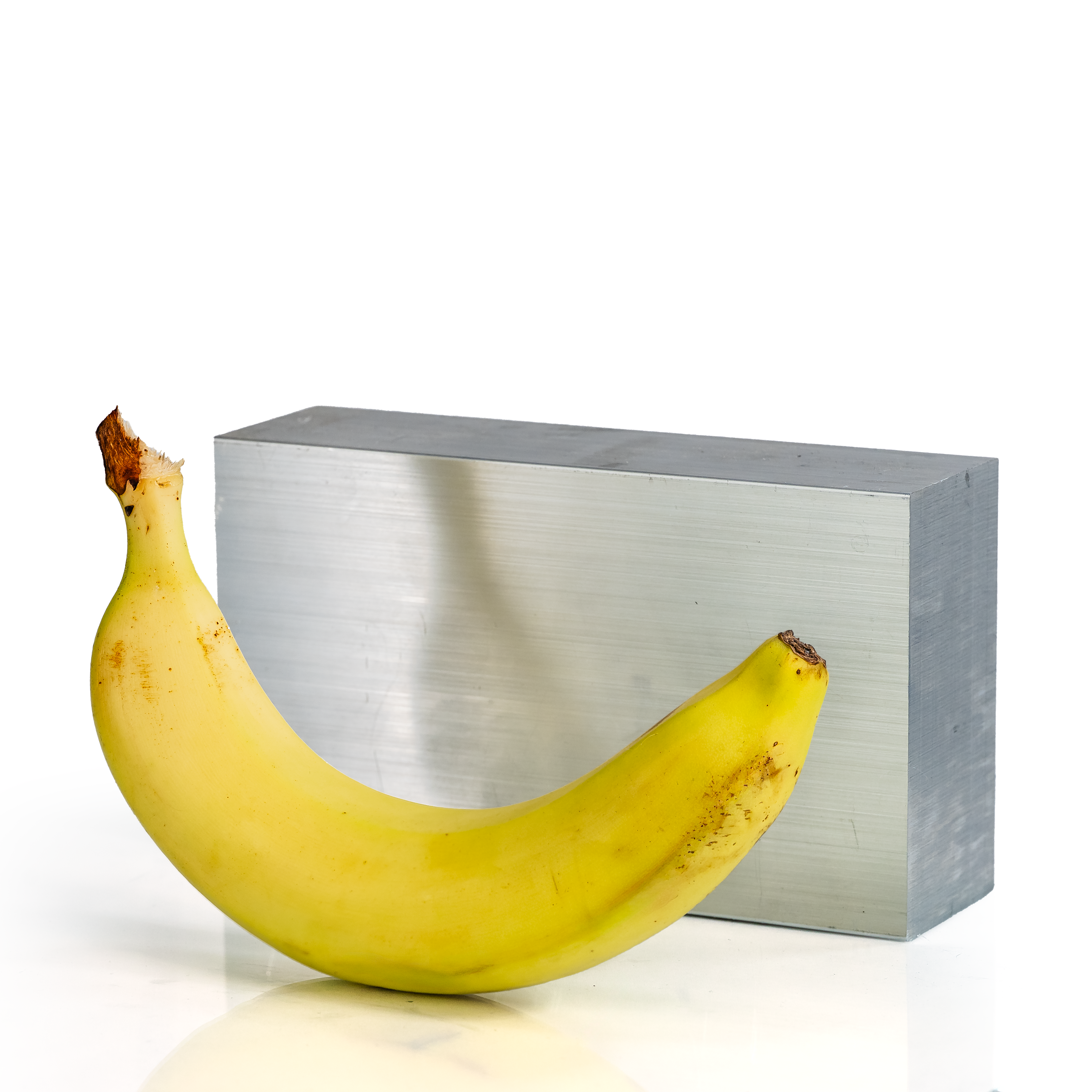 2x4x6 6061 T6 Aluminum Block with banana for scale - BananaMetals.com