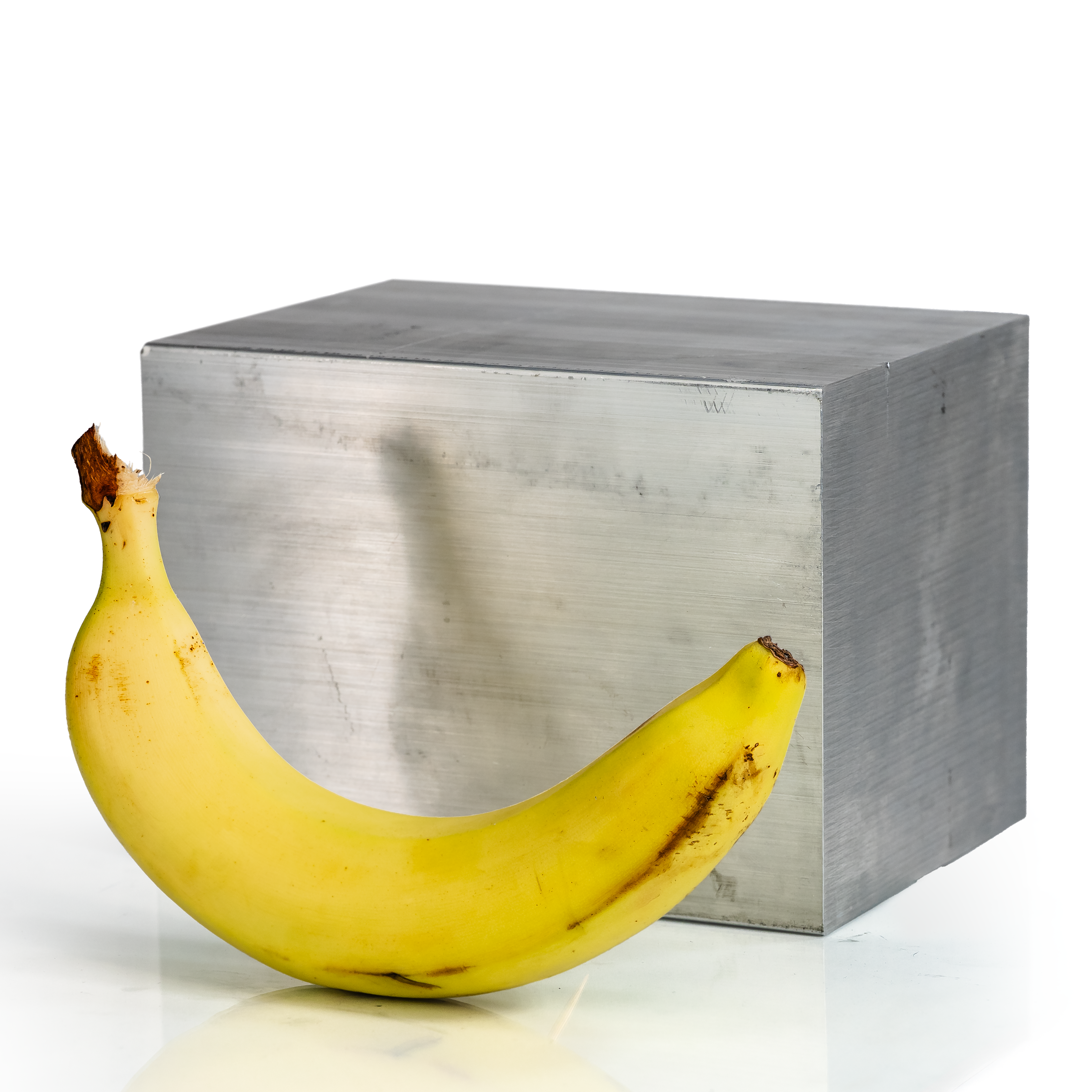 5x7x7 6061 T6 Aluminum Block with banana for scale - BananaMetals.com